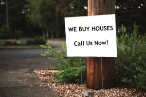 We Buy Houses Bandit Sign