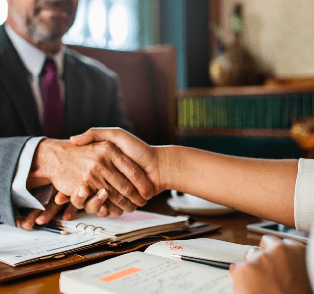 Real Estate Agents Shaking Hands