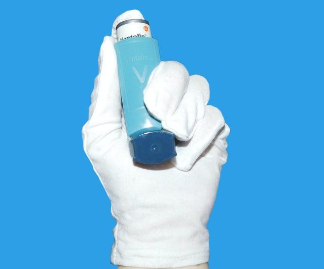 A Person Holding An Inhaler- Common Effect Of Mold 